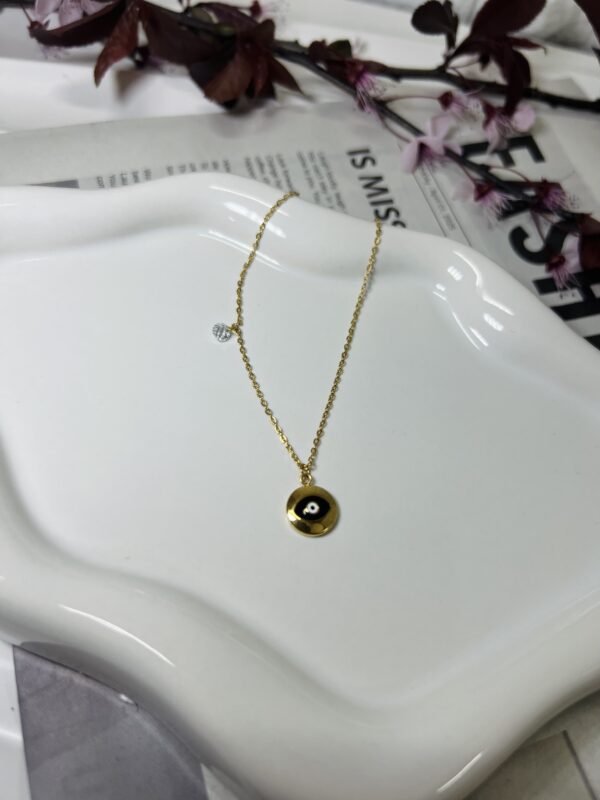 Small Black  Golden Eye With  Zircon
